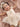La barboteuse rose champagne pour bébé fille