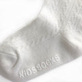 Emery White Socks Fabric Swatch